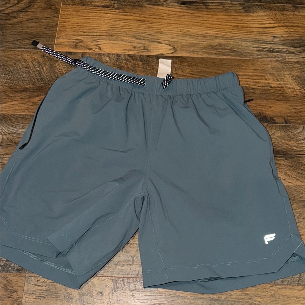Men’s Fabletics blue shorts size small